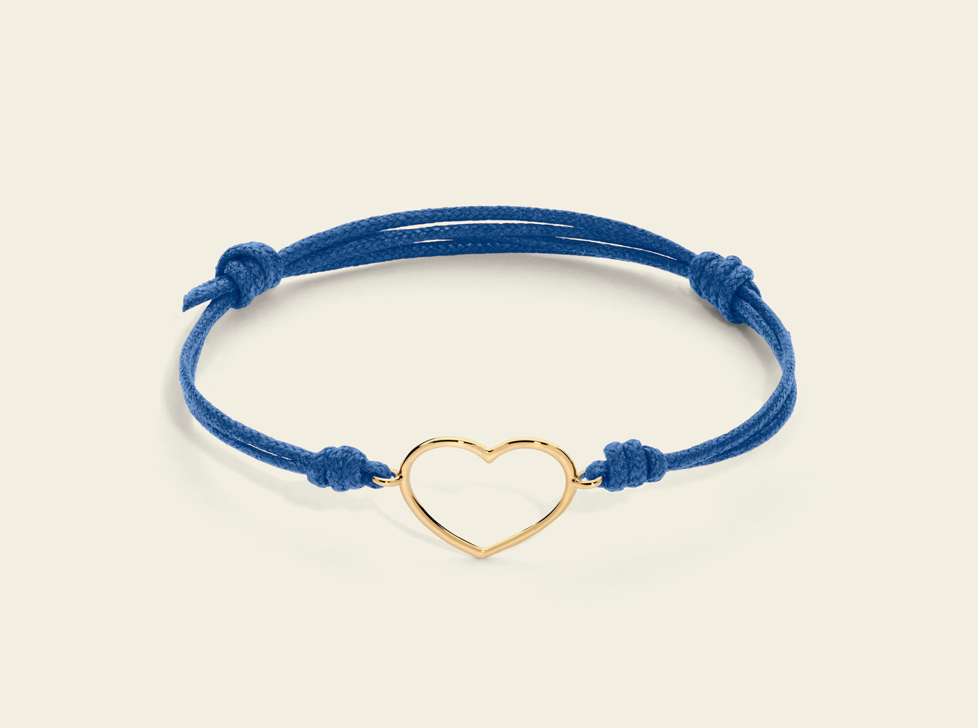 Bracciale cordino con cuore medio a filo